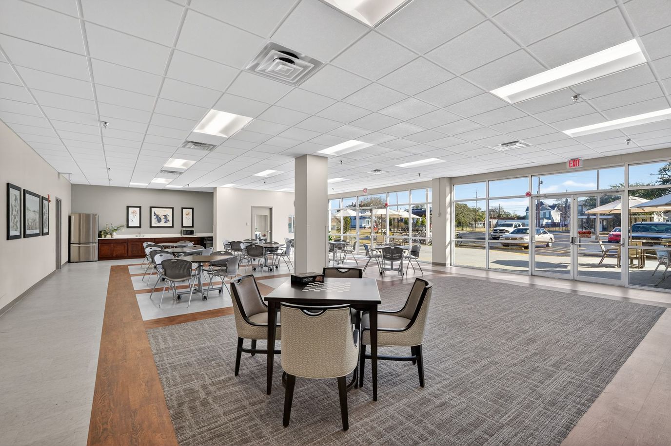 Bright common area with tables and chairs