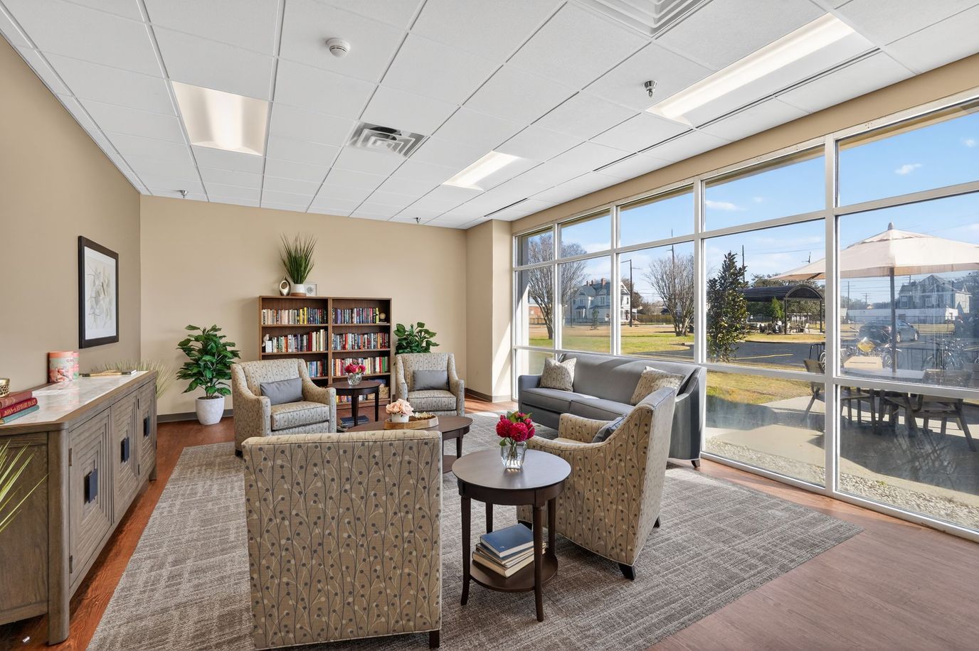 Bright common area with comfortable seating and natural light