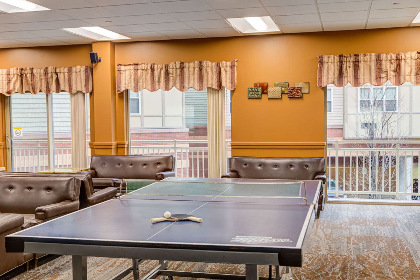 Interior common area with a ping pong table