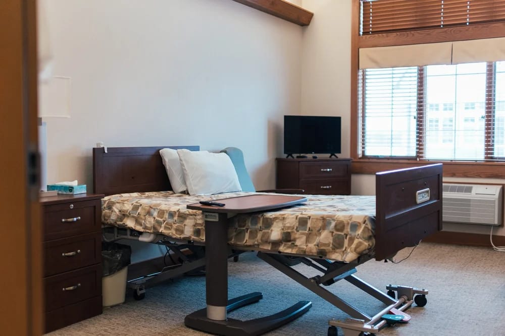Private resident room with an adjustable bed