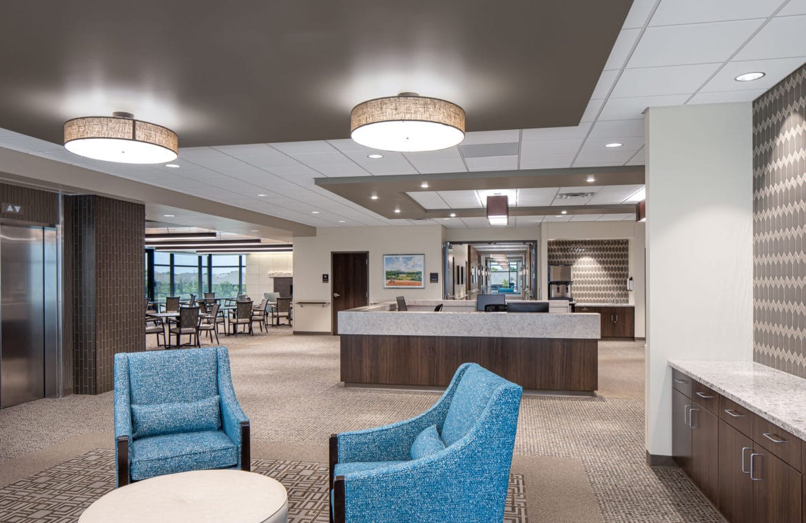 Bright interior lounge area with seating and dining space