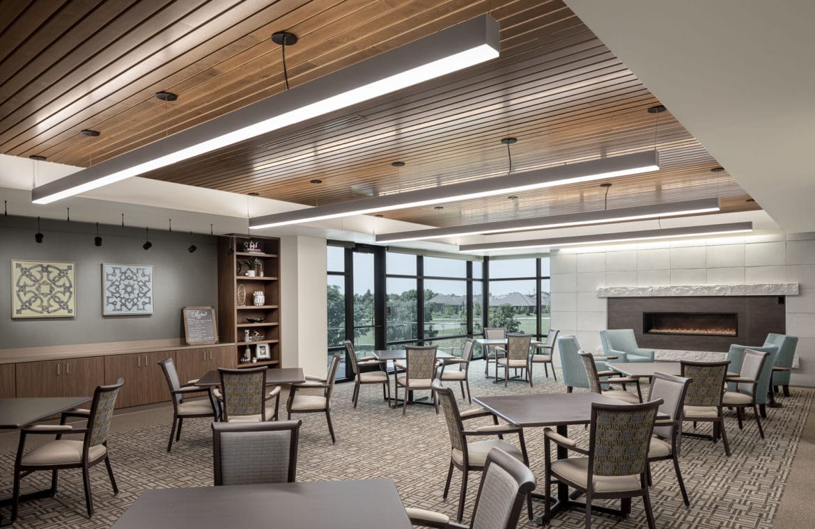 Bright common area with tables and chairs