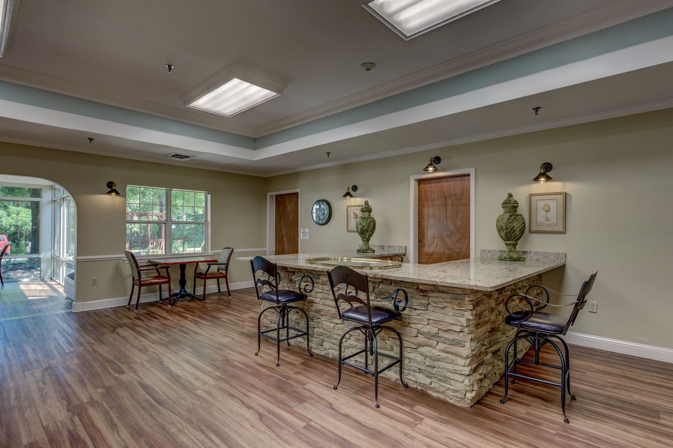 Interior view of a common area with a bar counter and seating