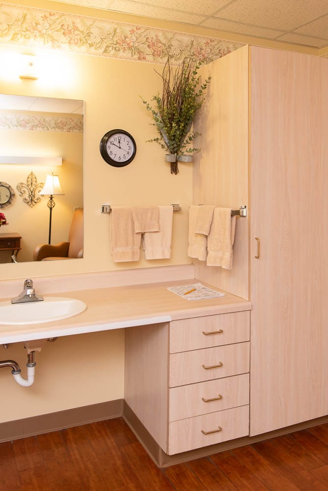 Well-lit resident bathroom with modern fixtures
