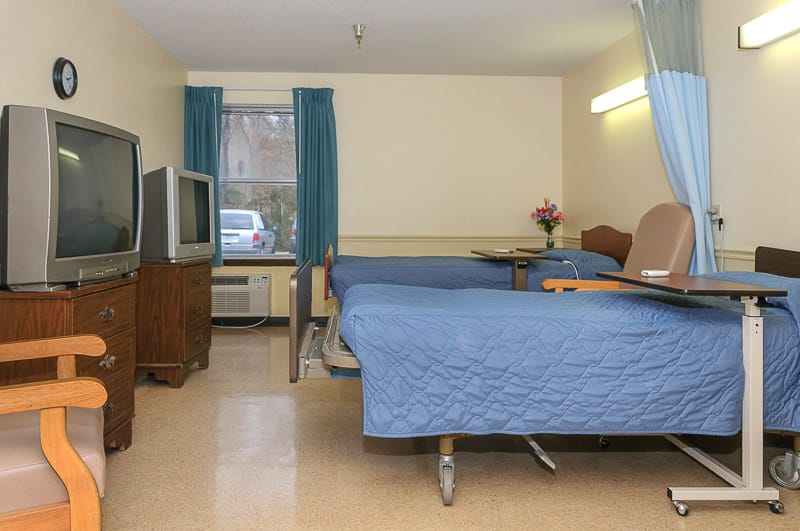 Interior view of a shared resident room with two beds