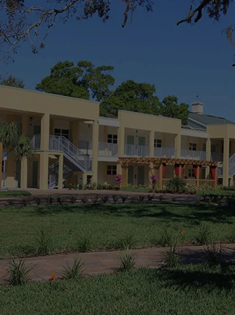 Exterior view of the assisted living facility with landscaping