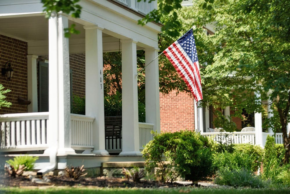 Exterior view of a building with an American flag