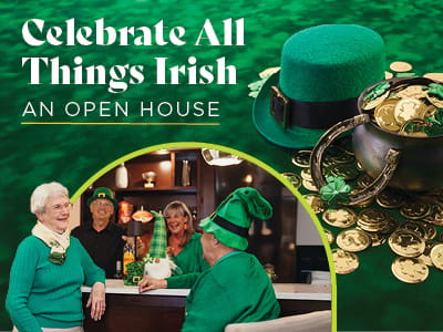 Residents enjoying an open house celebration with Irish theme