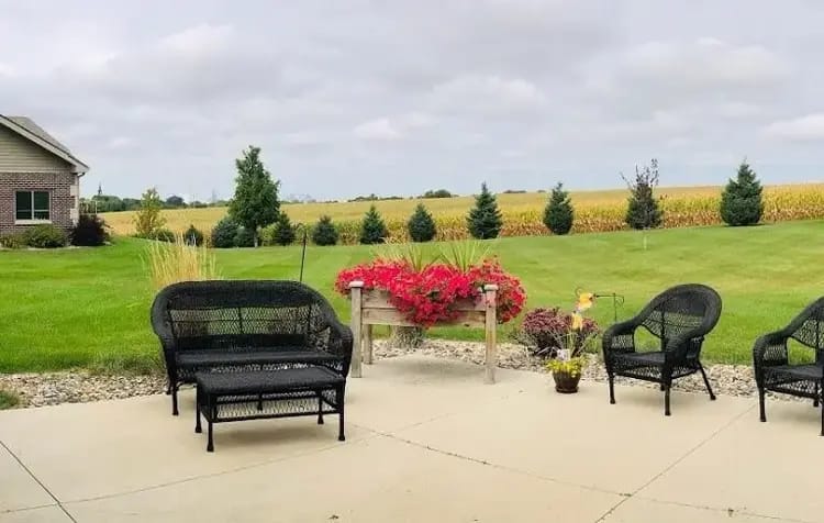 Outdoor seating area with a view of gardens