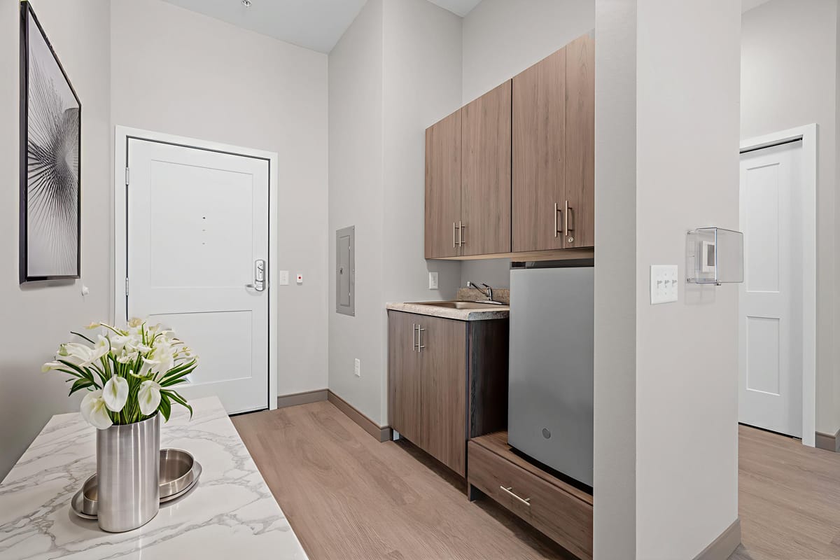 Interior view of a resident room with kitchenette