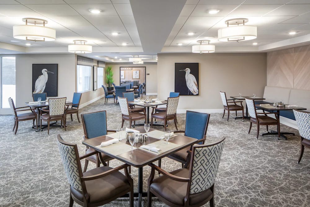Dining room with tables set for a meal