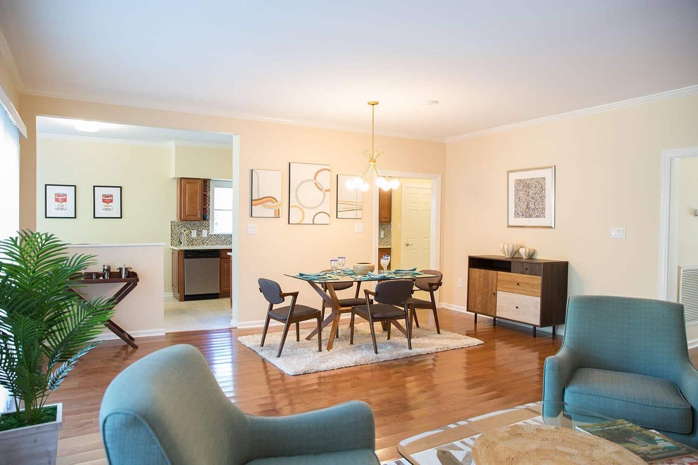 Bright interior of a shared common area with dining table