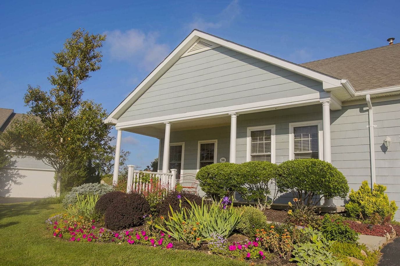 Exterior view of a residential building with landscaping
