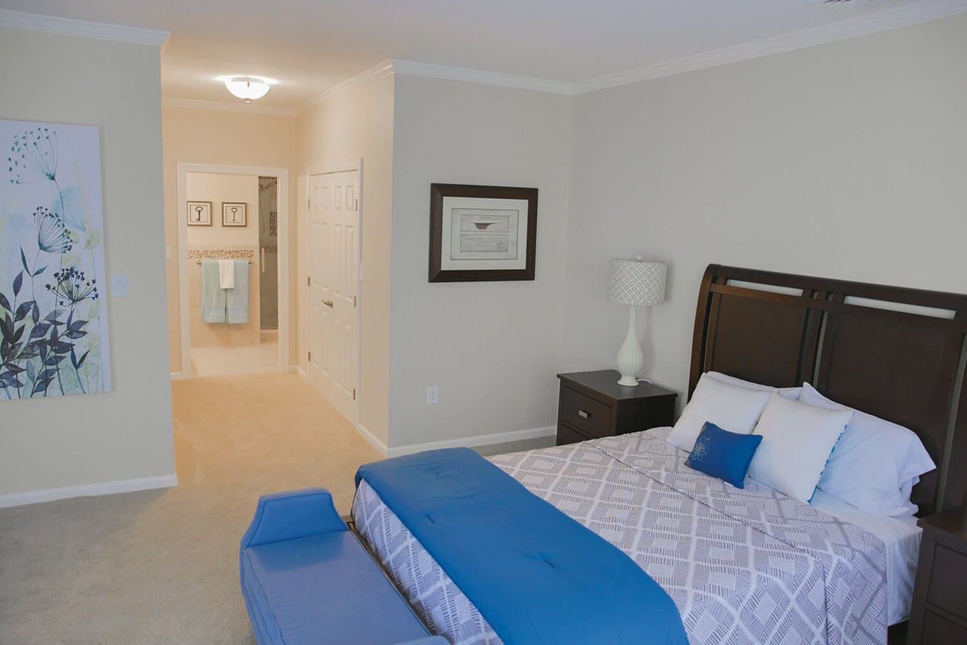Bright and cozy resident bedroom with decorative accents