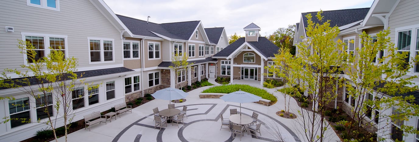 Aerial view of a landscaped courtyard with seating