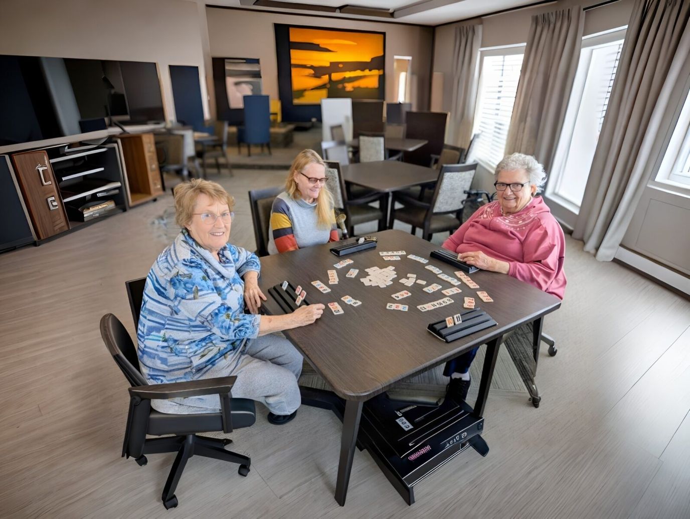 Residents playing cards in a common area