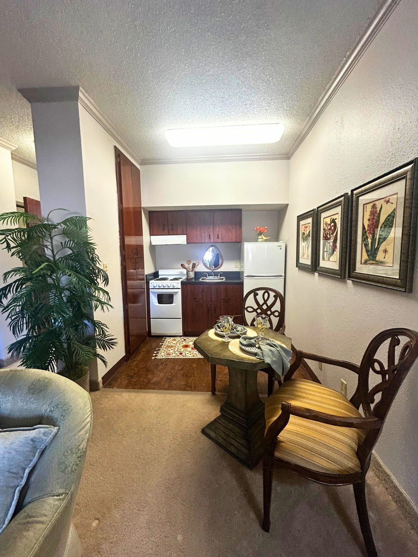 Cozy interior of a resident room with a kitchenette