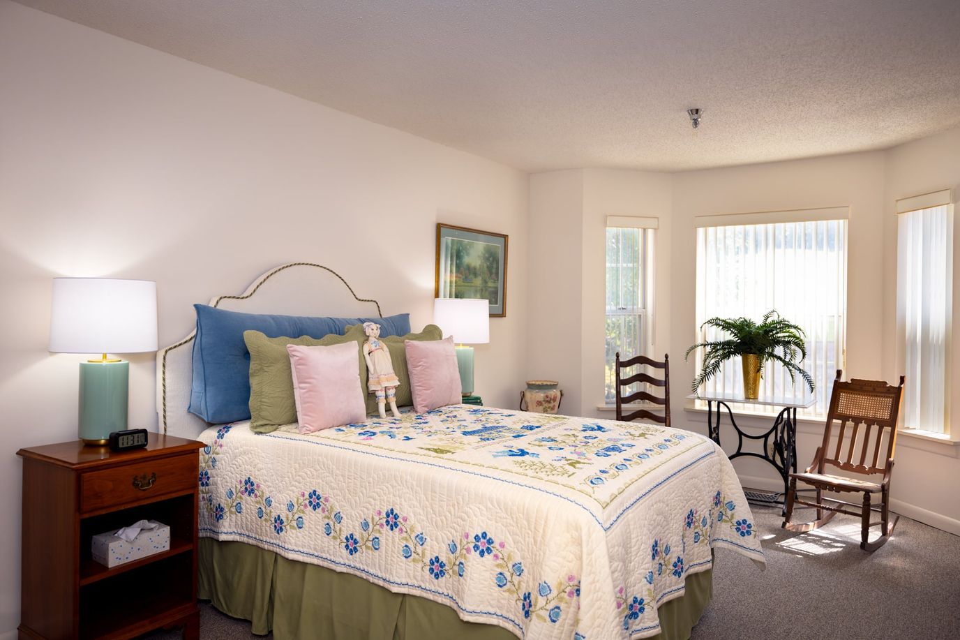 Cozy private resident room with bed and seating area