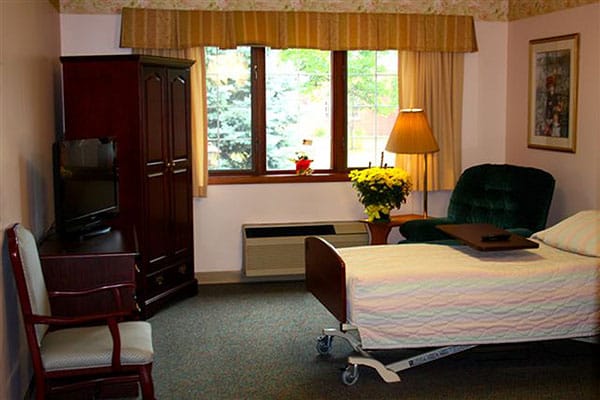 Cozy resident room with furniture and decor
