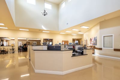 Bright and spacious lobby area with seating and activity setup
