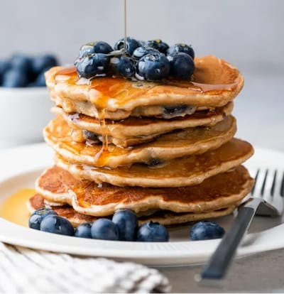 Granville Gardens Retirement Residence, assisted living — Stack of pancakes topped with blueberries and syrup