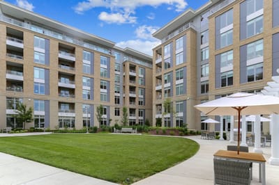 Exterior view of a modern assisted living facility's outdoor space