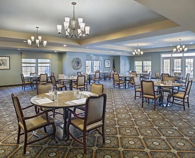 Bright dining room with tables ready for meals