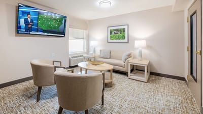 Cozy living area with sofa and TV