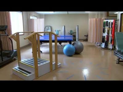 Physical therapy room equipped with exercise equipment