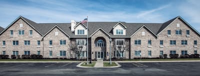 Exterior view of Bloom at Kokomo with flag