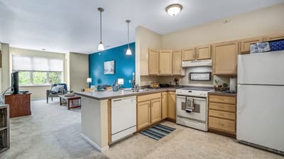 Bright interior view of a kitchen and living area