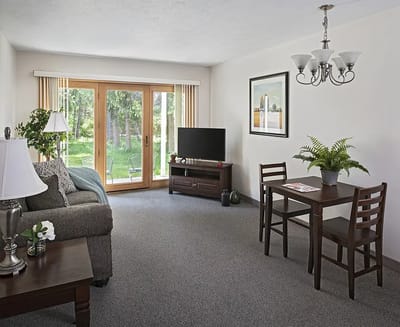 Cozy living area of a resident's apartment with outdoor view