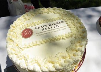 Grace Barker Nursing Center, Nursing Home in Warren, RI — Decorative cake with logo for Grace Barker Health