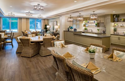 Elegant dining area with wicker furniture and decor