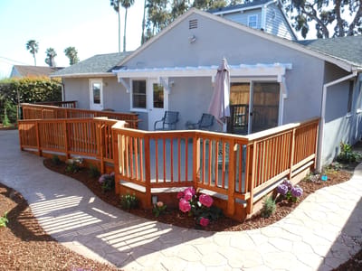 Outdoor area with a wooden walkway and seating