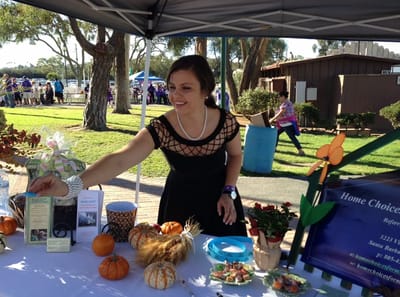Staff member engaged in an outdoor event.