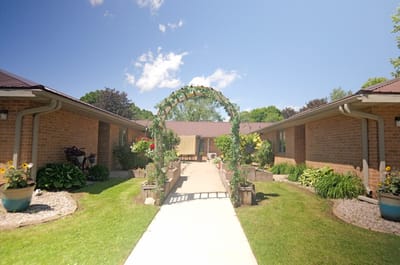 Beautiful garden pathway leading to the facility