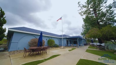 Exterior view of Alpine View Lodge with outdoor seating