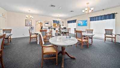 Common area with dining tables and chairs