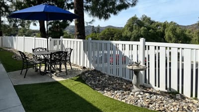 Outdoor seating area with a view and fountain