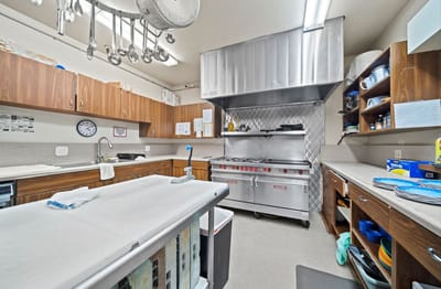 Commercial kitchen with stainless steel appliances