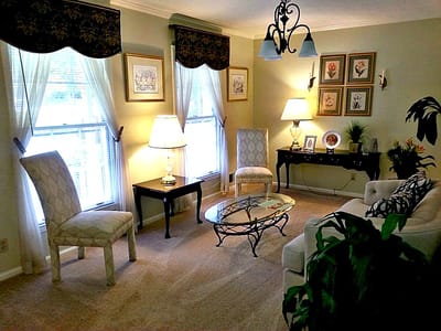 Cozy living room area with comfortable seating and decorations