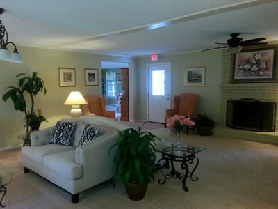 Cozy interior common area with seating and plants