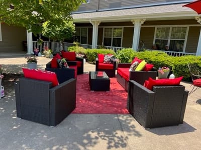 Outdoor seating area with bright cushions
