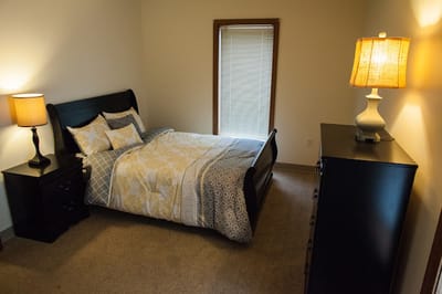 Cozy private bedroom with light decor