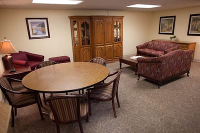 Interior common area with seating and dining table
