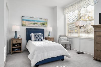 Cozy resident room with beach-themed decor