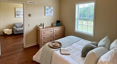 Cozy resident room with a bed and a view