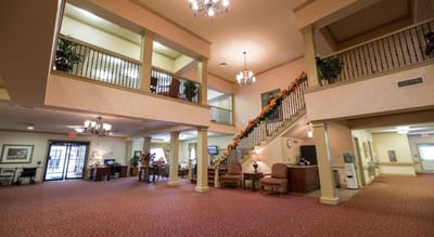Spacious interior lobby with residents and staff