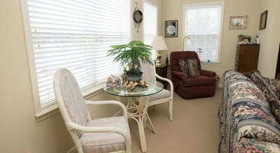 Cozy common area with chairs and a table